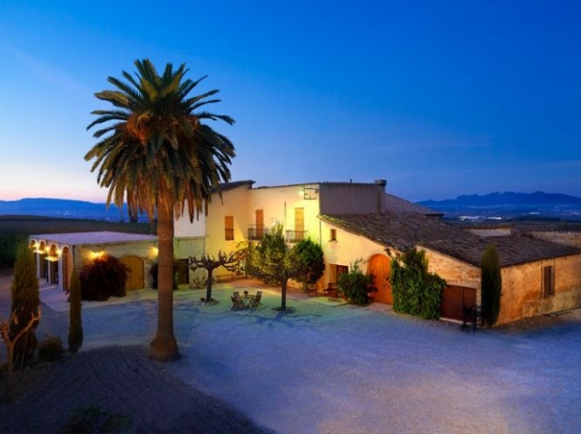  casa con palme al tramonto 